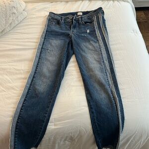 Skinny blue jeans with stripe on the side